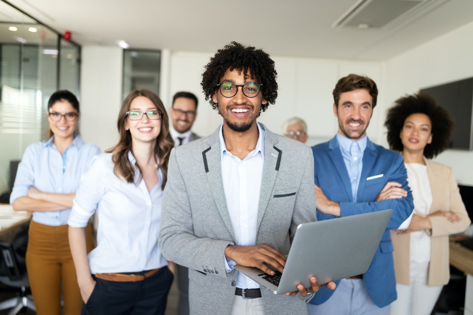 successful-team-of-young-perspective-businesspeople-in-office-1.jpg